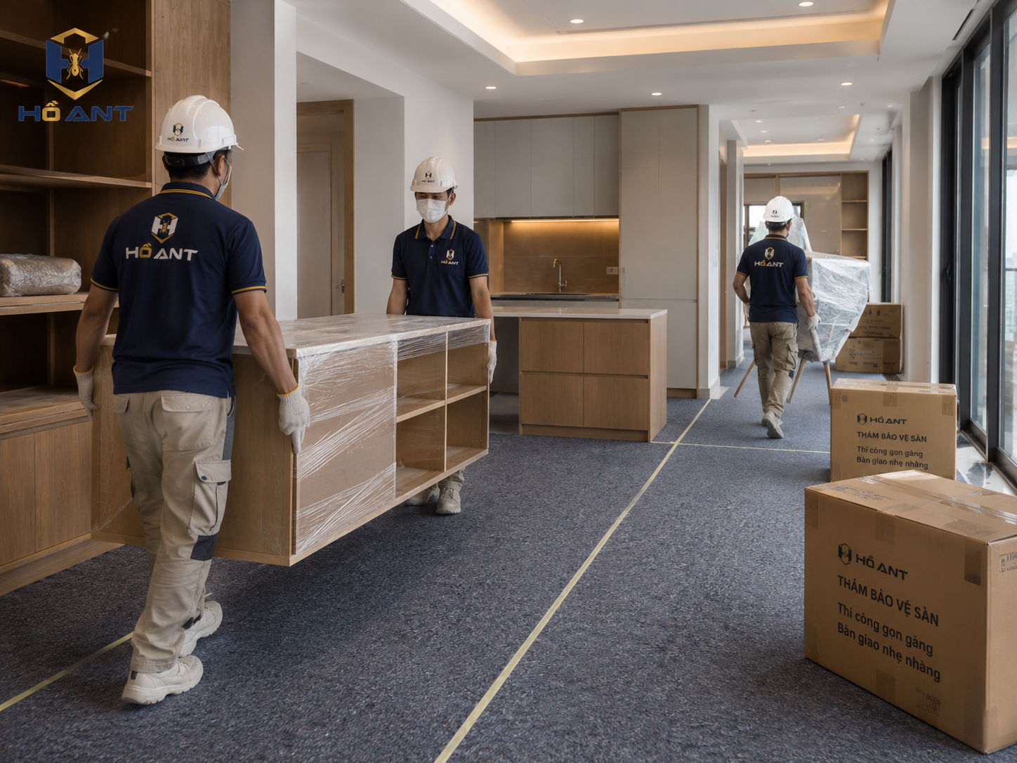 Lắp đặt nội thất sau khi đã trải thảm bảo vệ sàn.